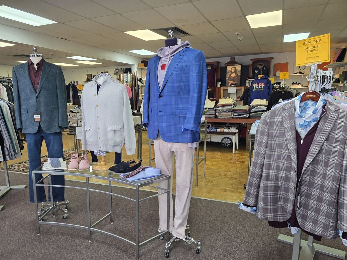 Inside the Label Legends showroom in Farmington Hills — sport coats styled on mannequins